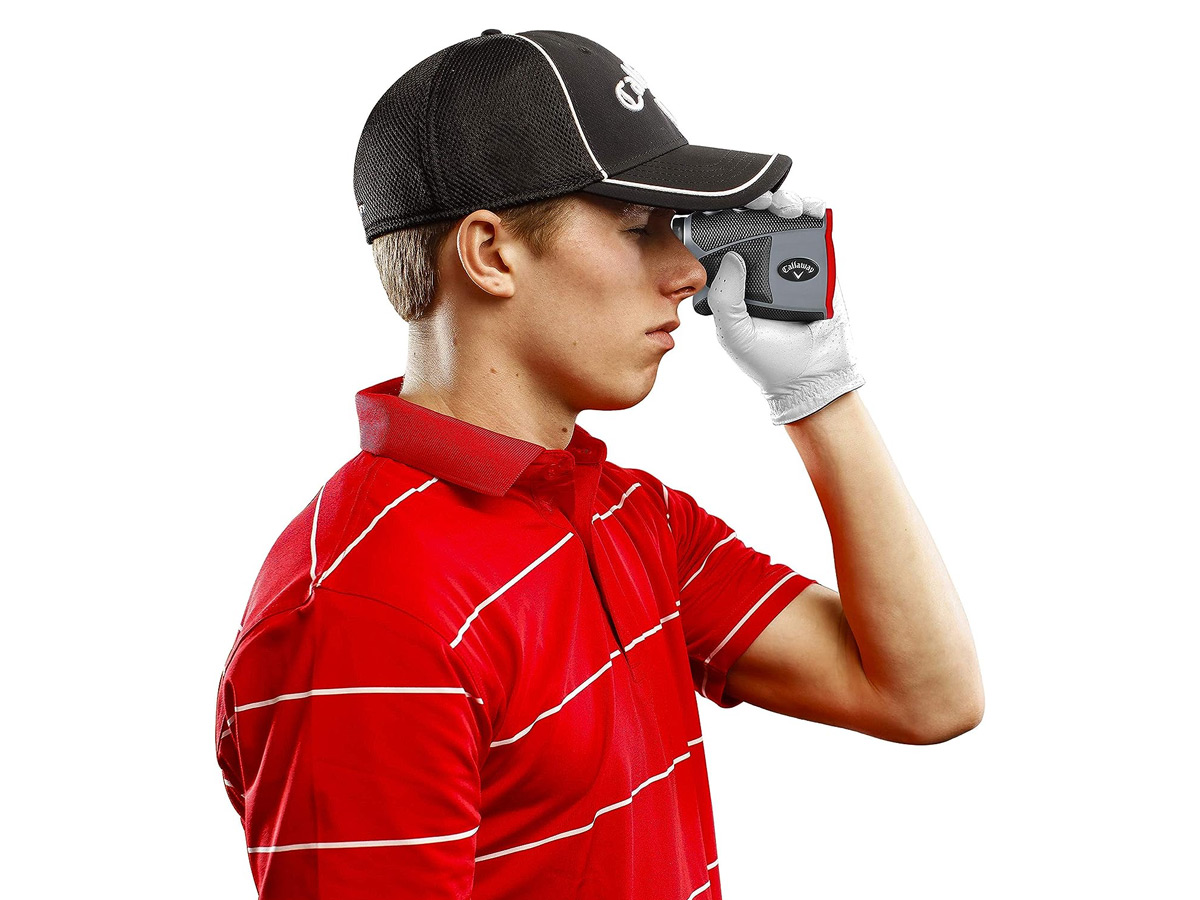 A man looking through the Callaway 300 Pro laser rangefinder.