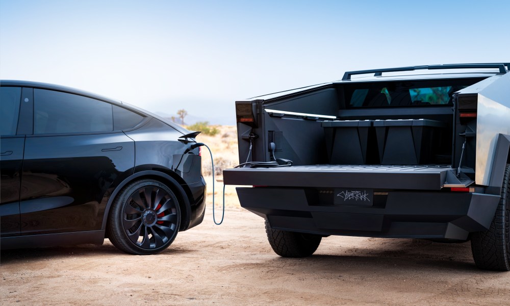 Tesla Cybertruck charging a Tesla EV using a bidirectional socket