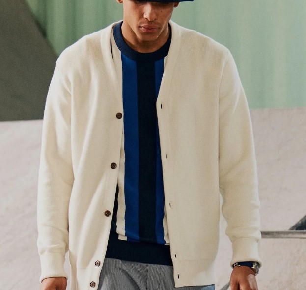 Man in white Ben Sherman cardigan