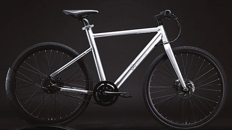 Mercedes EQ Silver Arrows eBike against a shaded gray background.