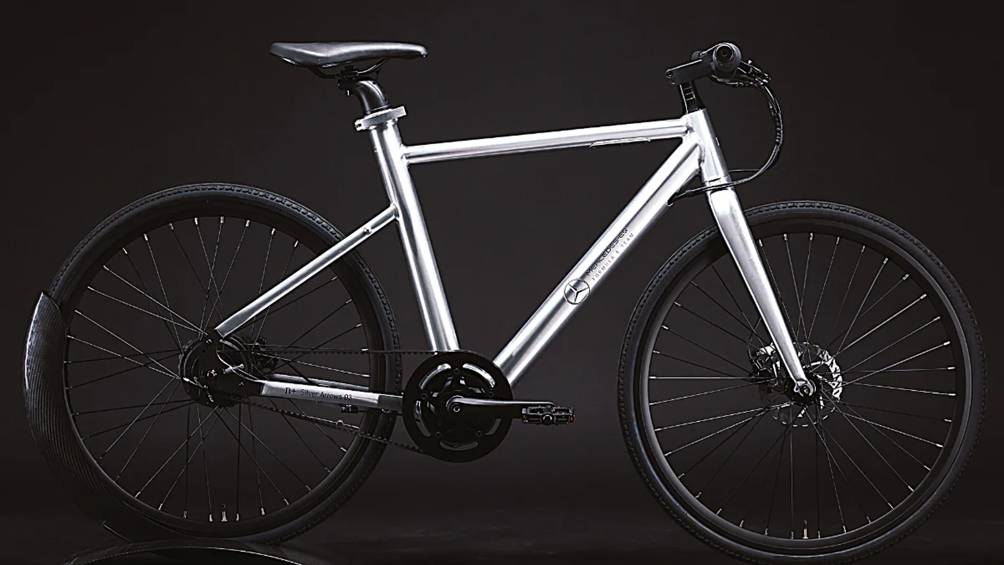Mercedes EQ Silver Arrows eBike against a shaded gray background.