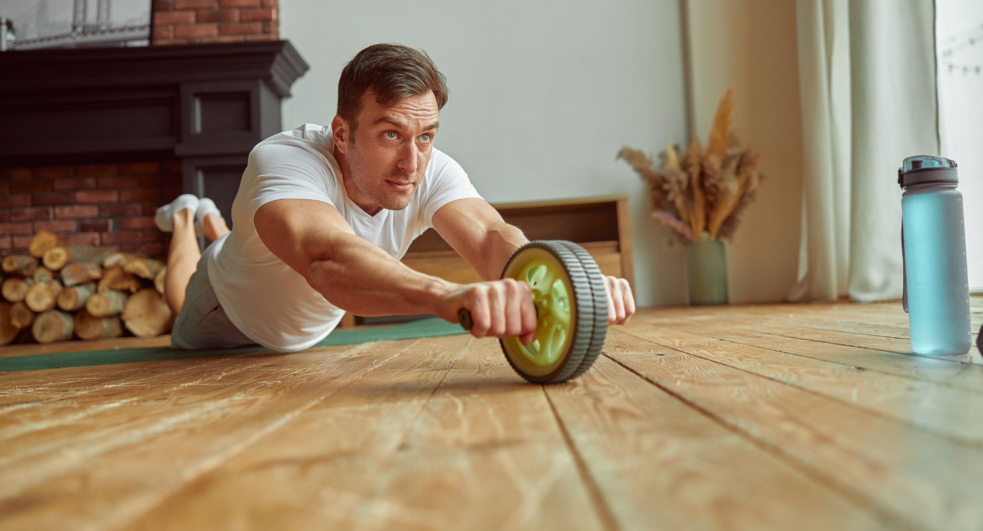 Man Using Outfit for Exercising Core Indoors