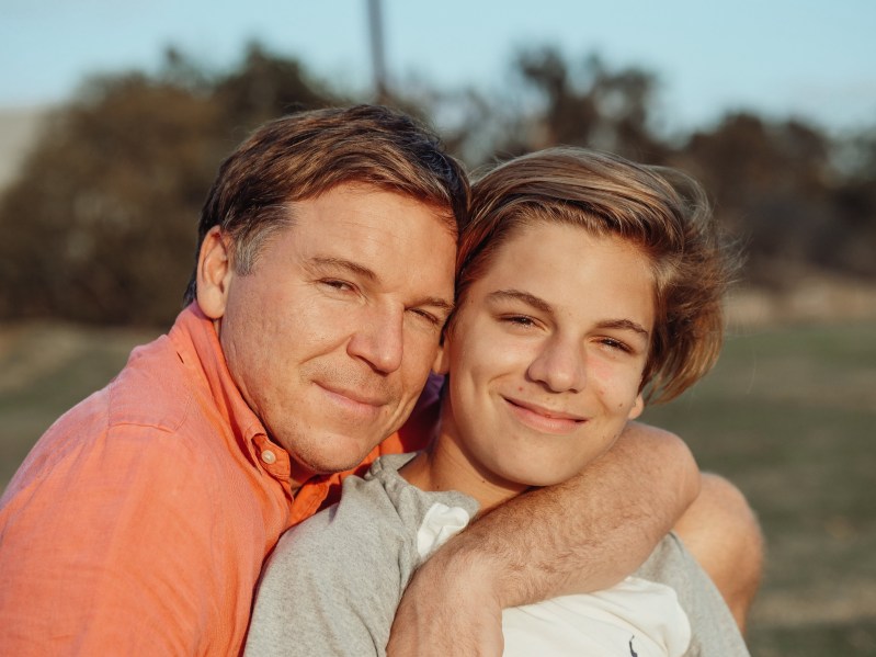 Father and son hugging