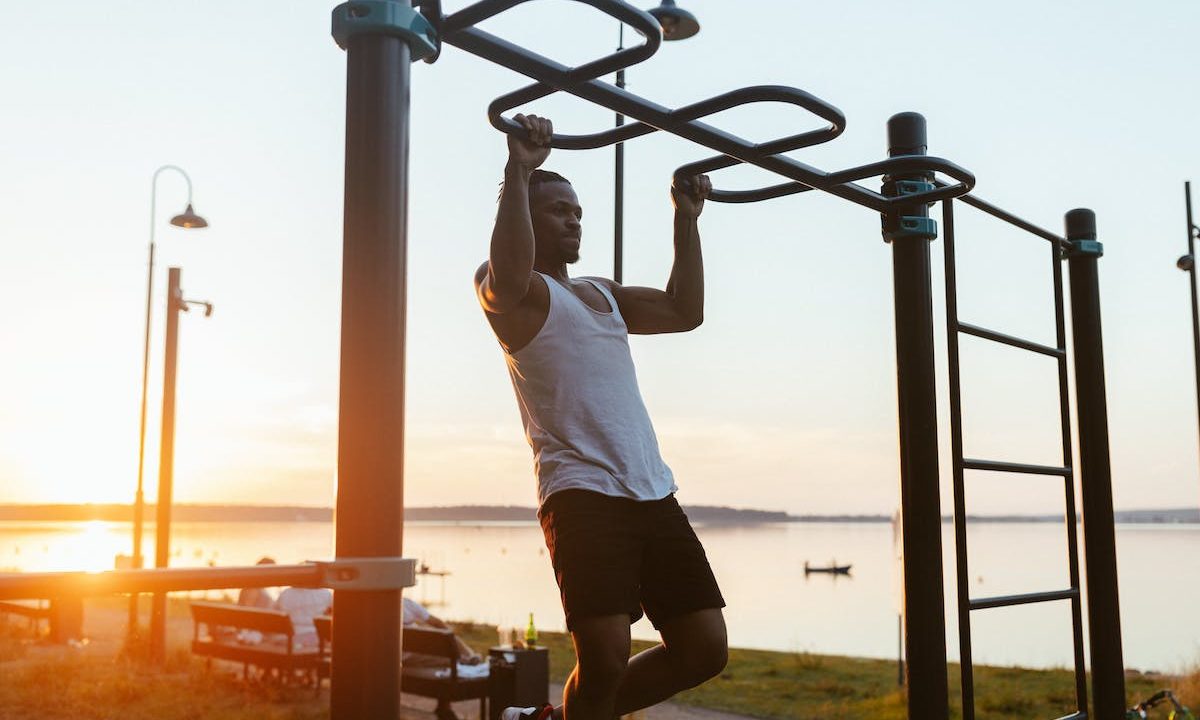a man doing pull ups