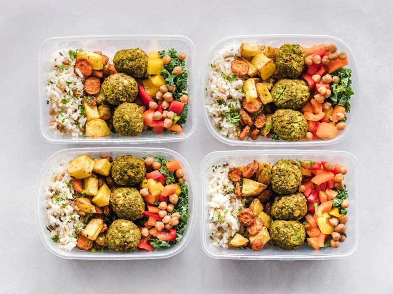 Four healthy meals prepped in containers