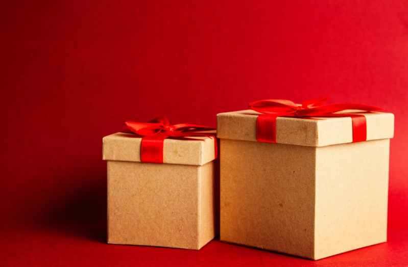 Wrapped presents with a red background