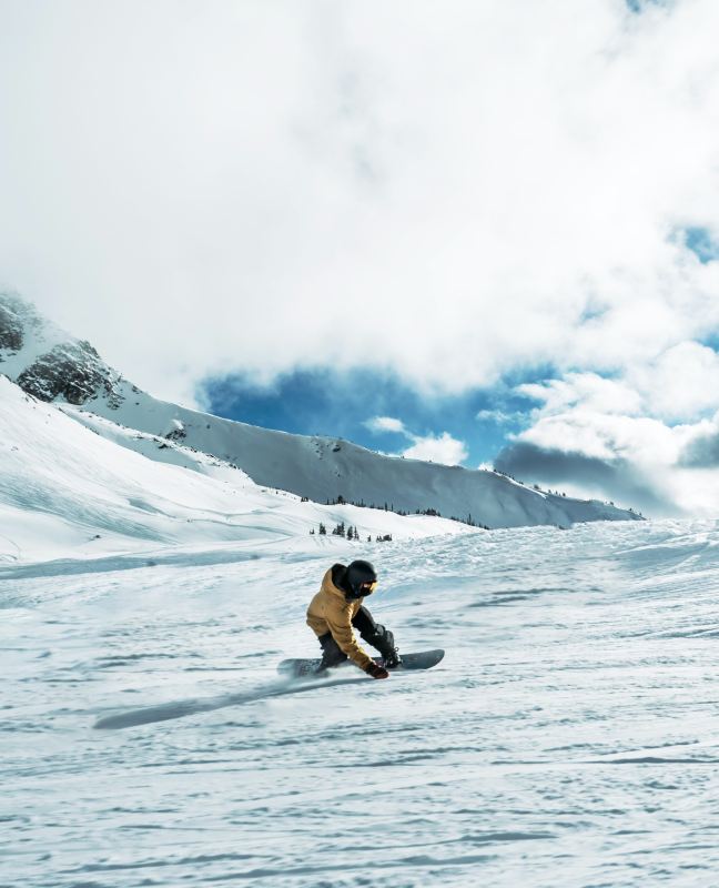 snowboarding turning on mountain