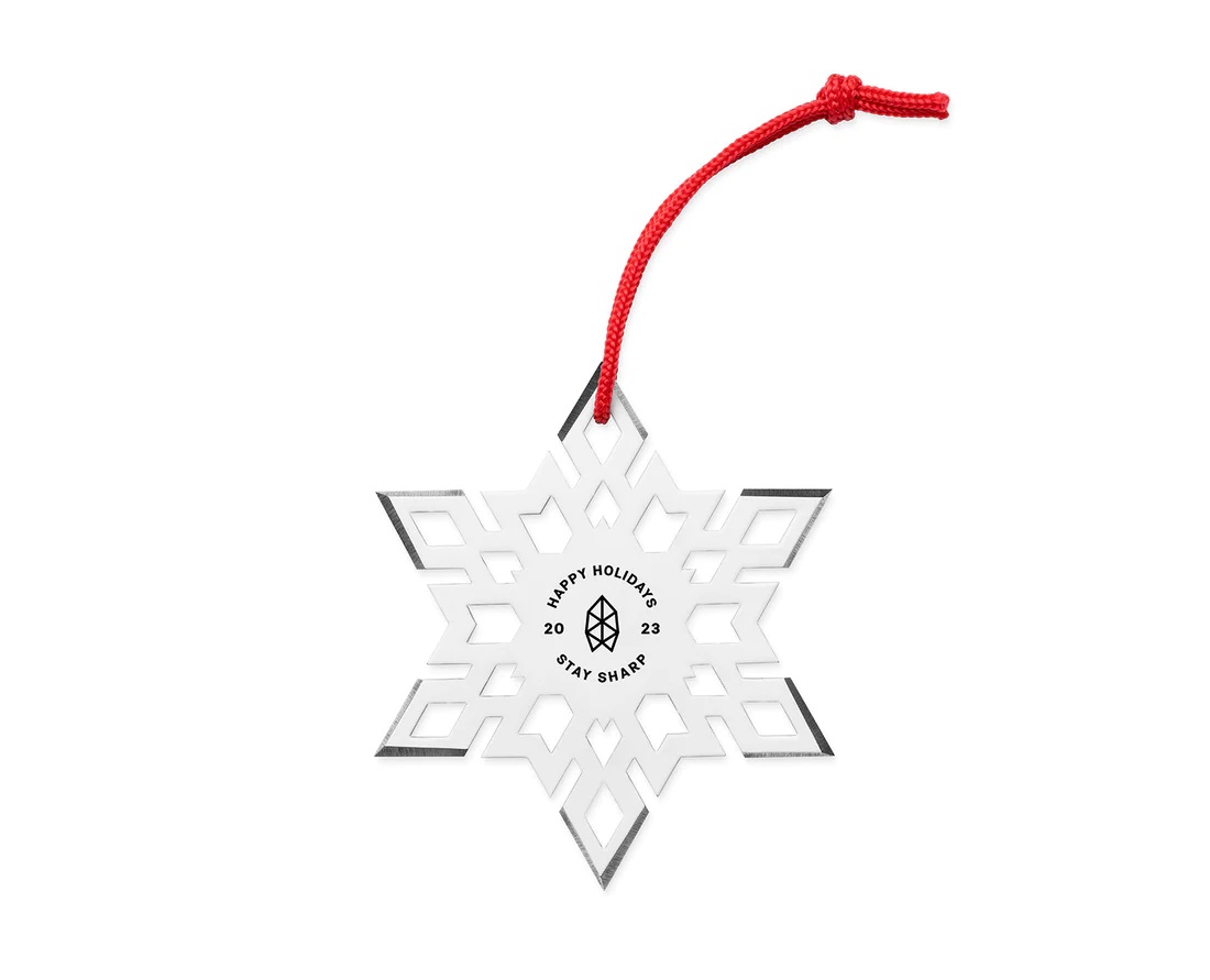 A close up of the Throwflake Christmas tree ornament.