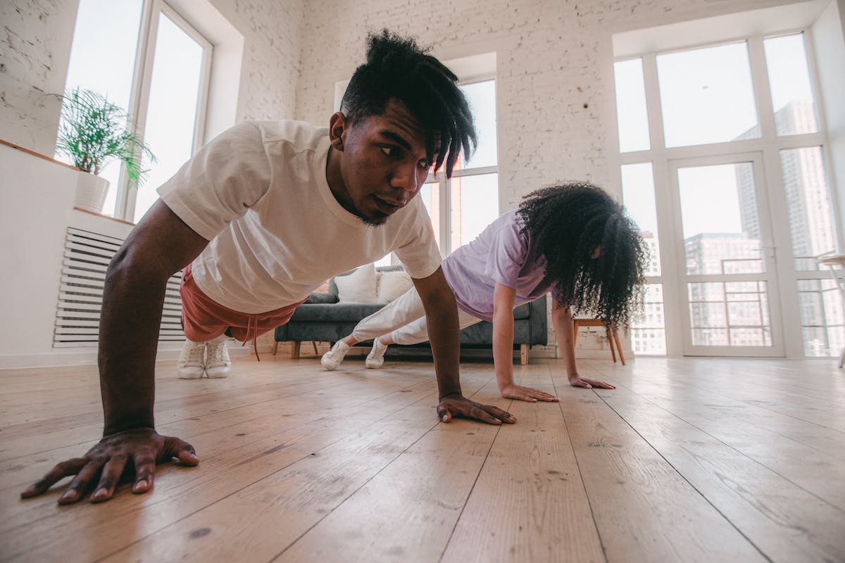 two people doing push ups