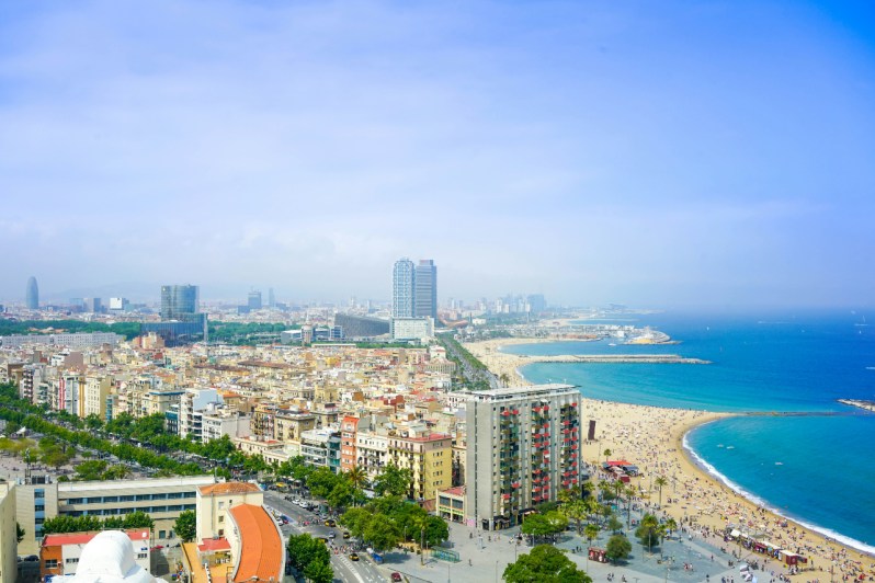 Sky view of Barcelona city beachhttps://unsplash.com/photos/birds-eyeview-photo-of-high-rise-buildings-f-DvU93UhTs