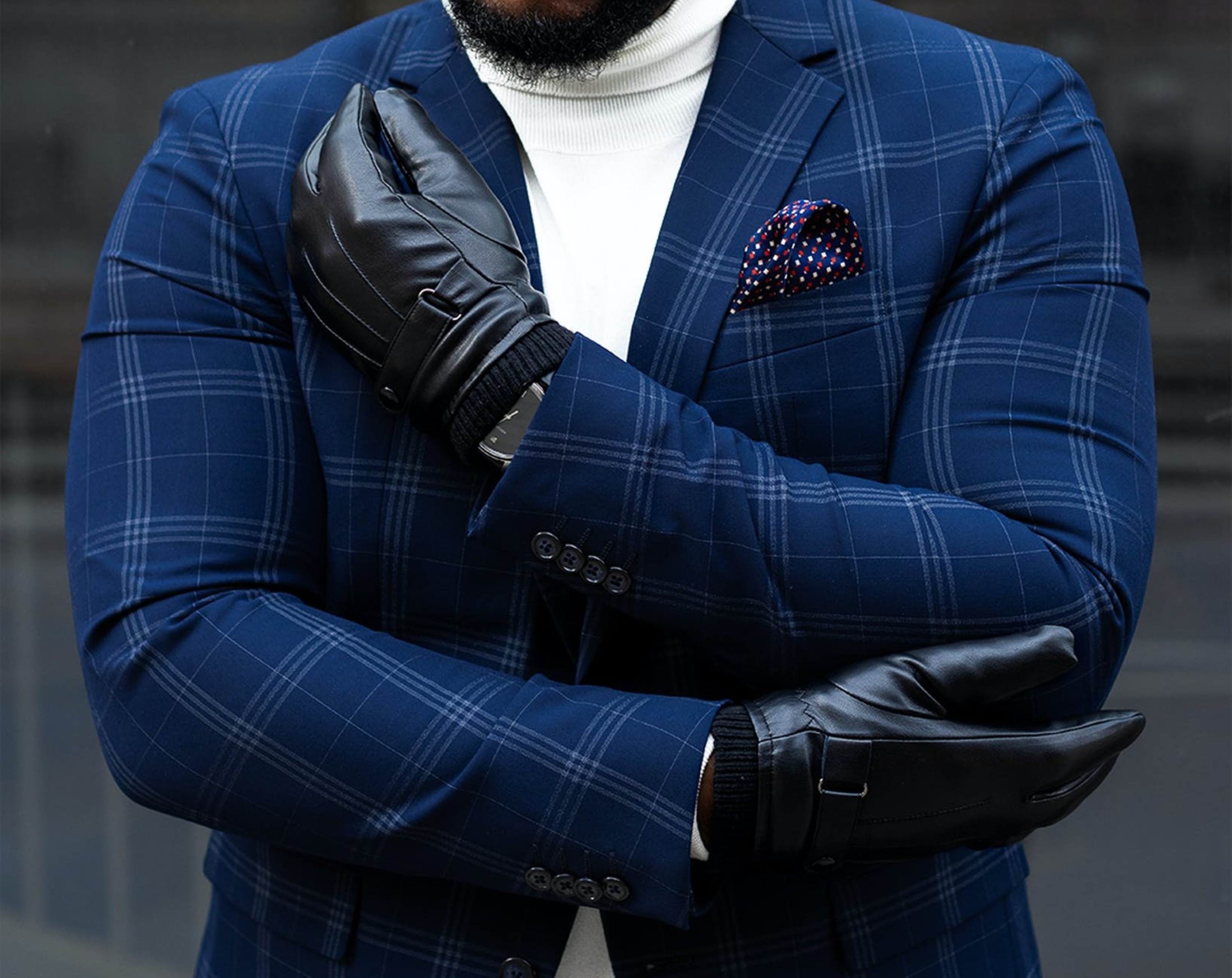 Man in suit with gloves