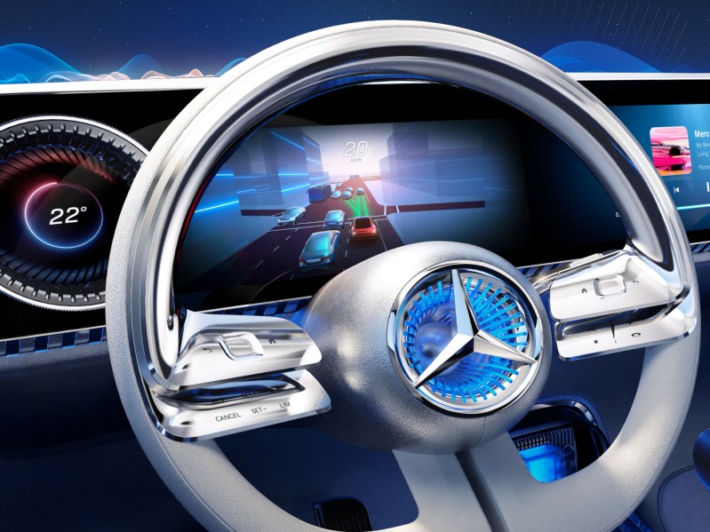 Mercedes-Benz MBUX steering wheel with multiple control button layers.