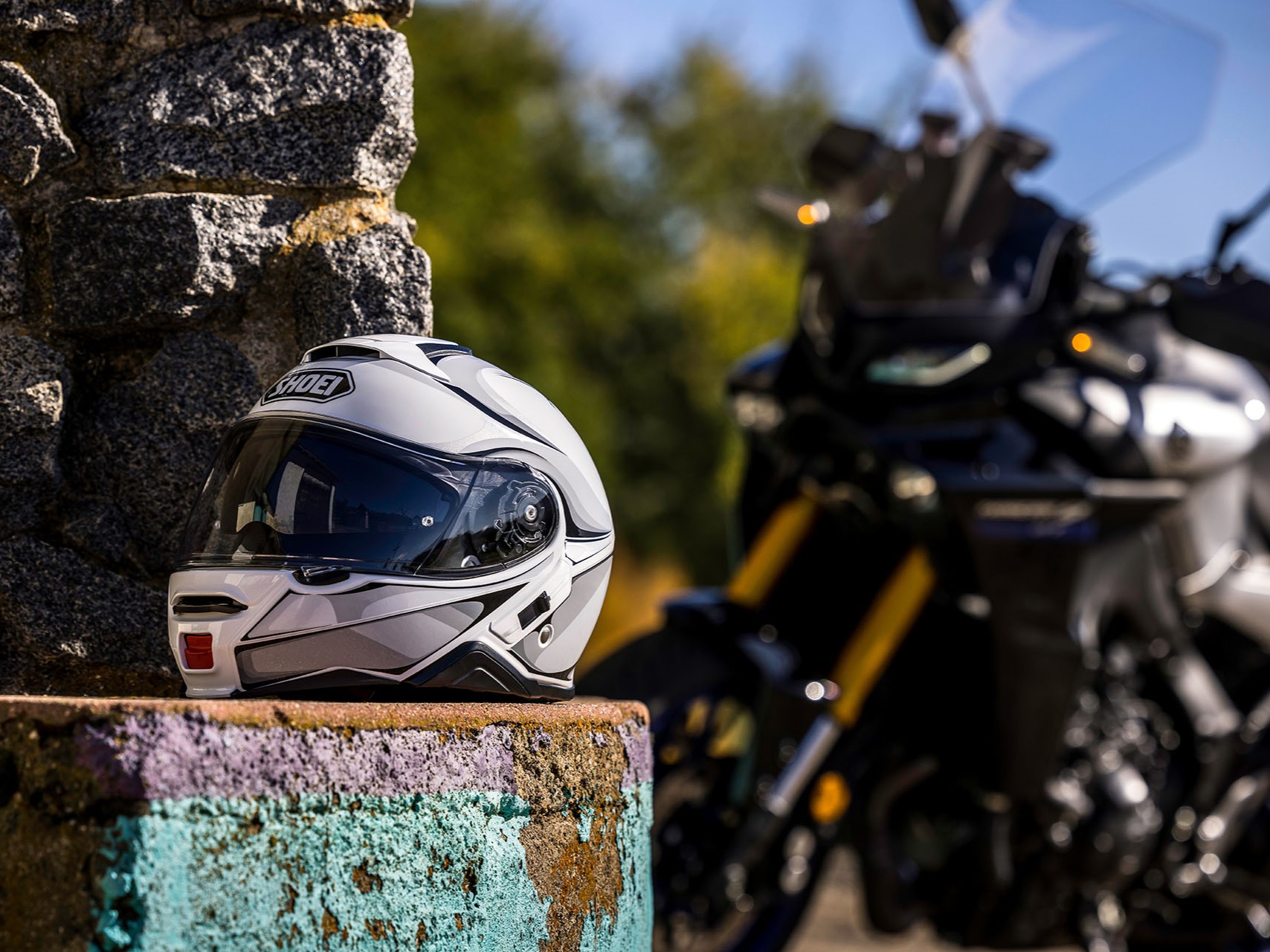 Shoei Neotec 2022 II motorcycle helmet on wall