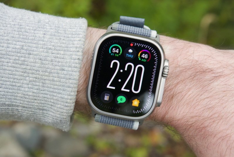 Someone wearing an Apple Watch Ultra 2, showing the Modular Ultra watch face.