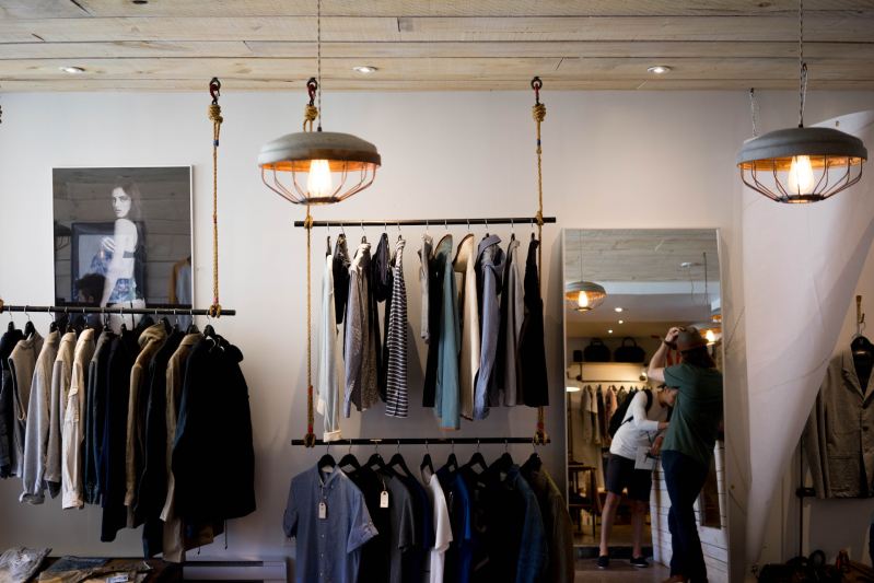 clothing hanging in men's store