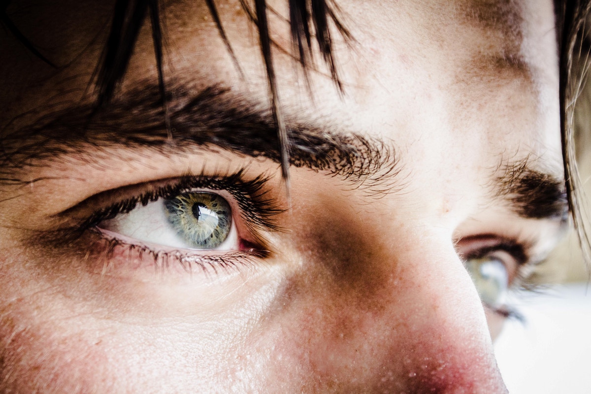 a close up of a man's eyes