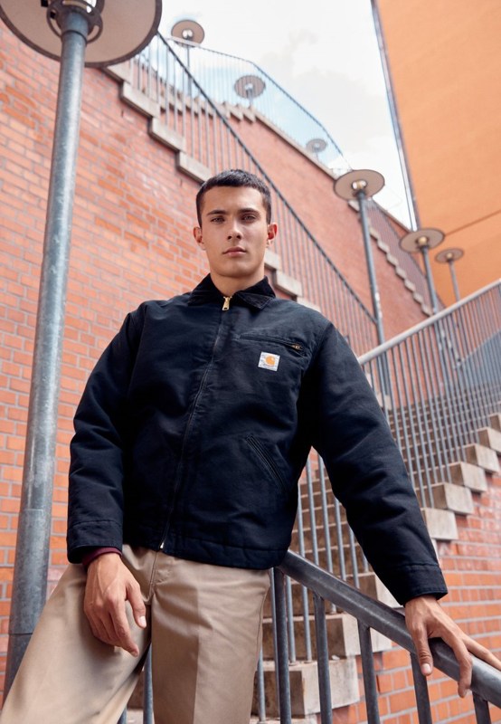 Carhartt WIP Detroit jacket on a model on the stairs