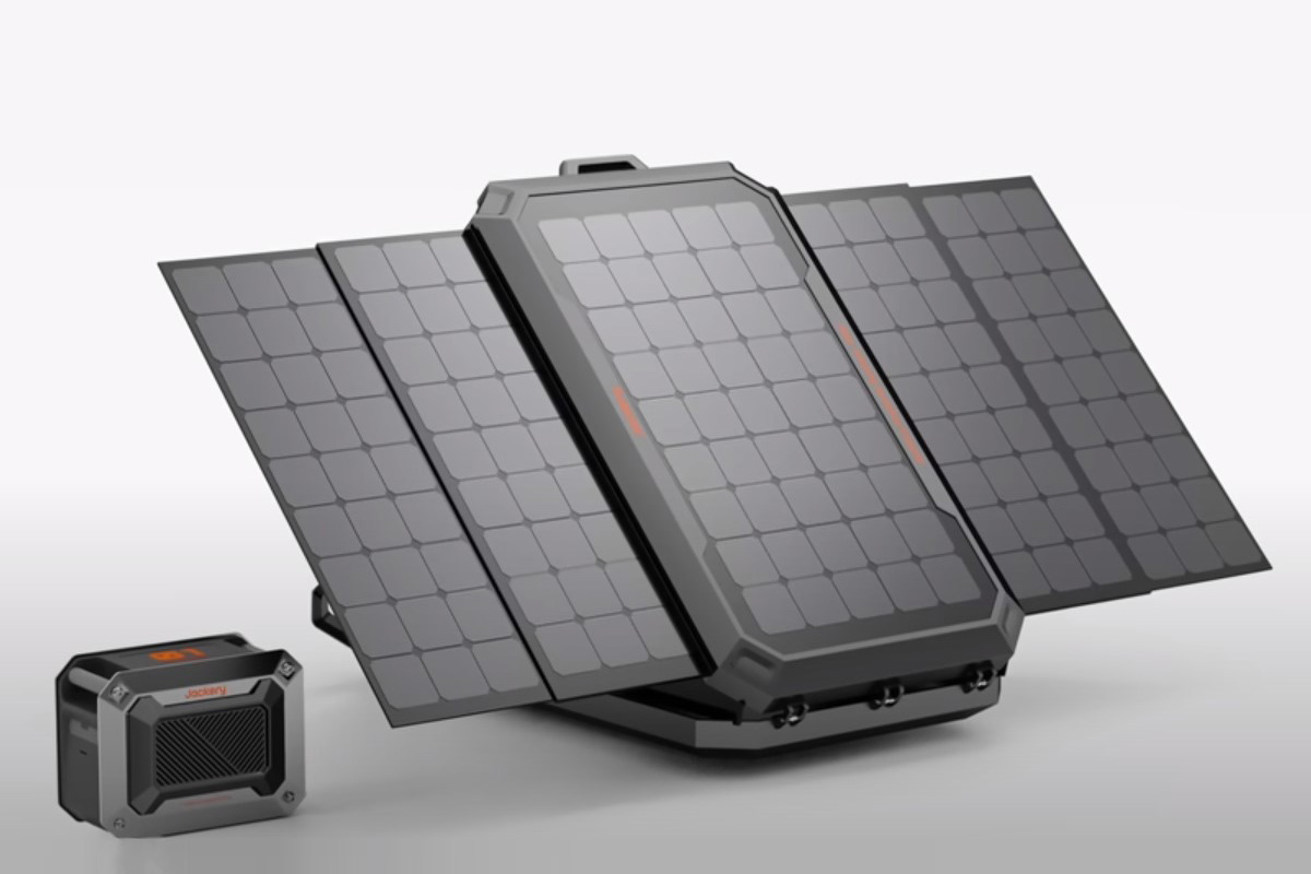 Jackery's solar rooftop tent concept with a portable power bank, isolated on a plain background.