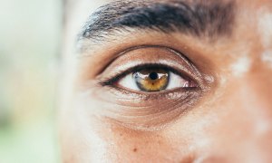 a close up of a man's eyes