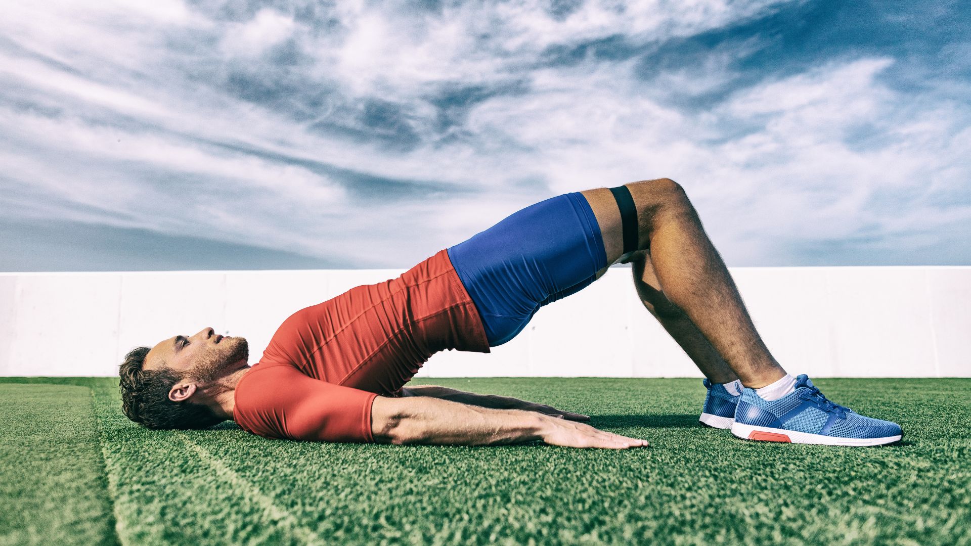 Man Doing Bridge Exercise with Resistance Band