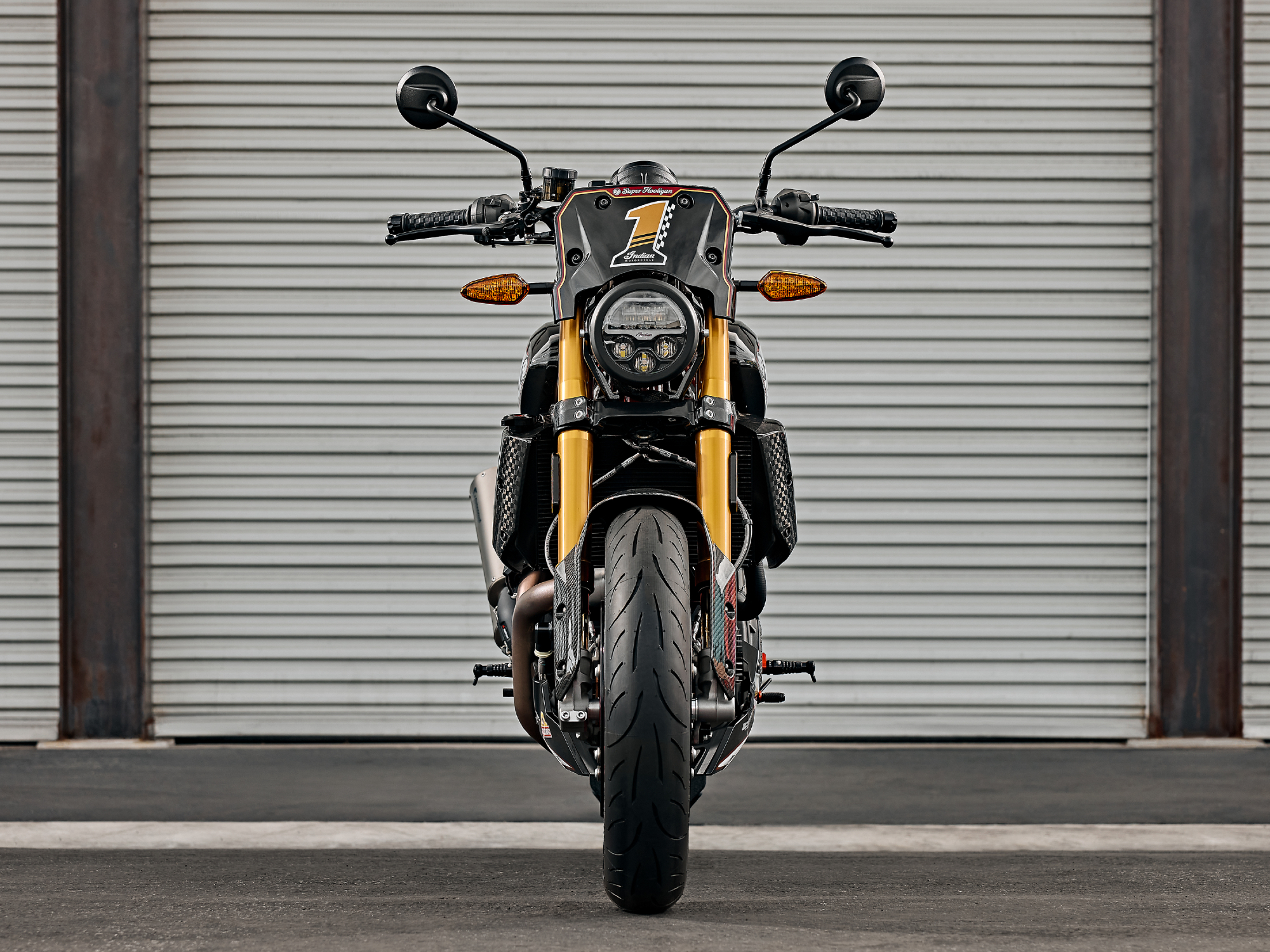 indian motorcycle roland sands design collaboration 2024 ftr x rsd super hooligan direct front view parked in of an aluminum 