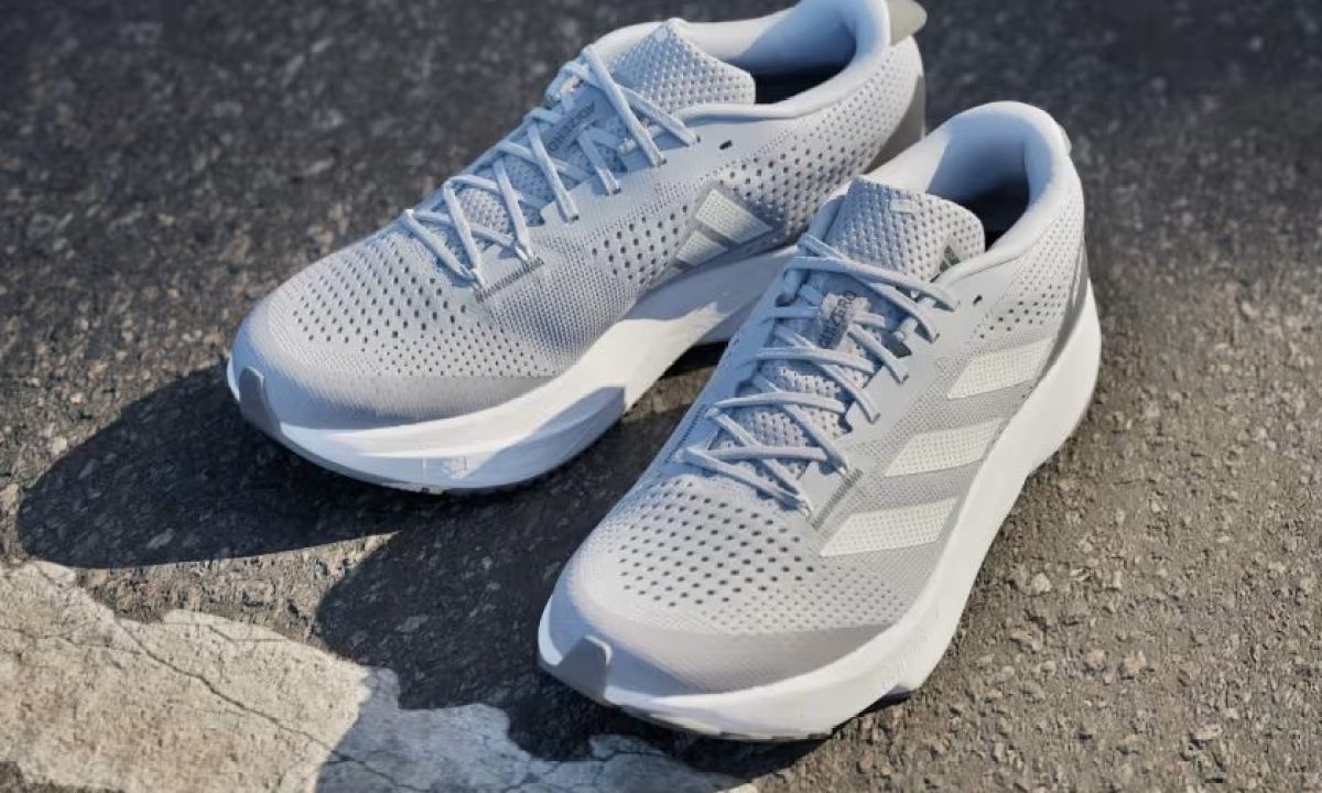 The Adidas Adizero SL on a road.