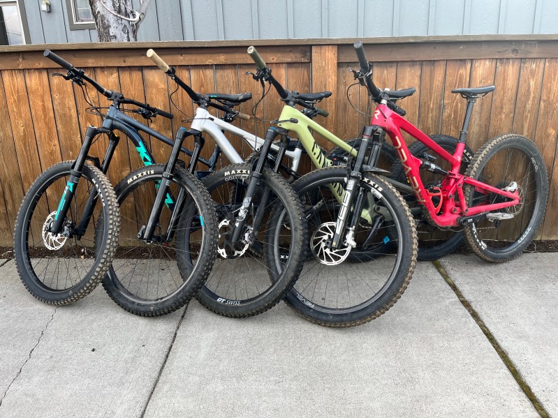 Four used mountain bikes lined up