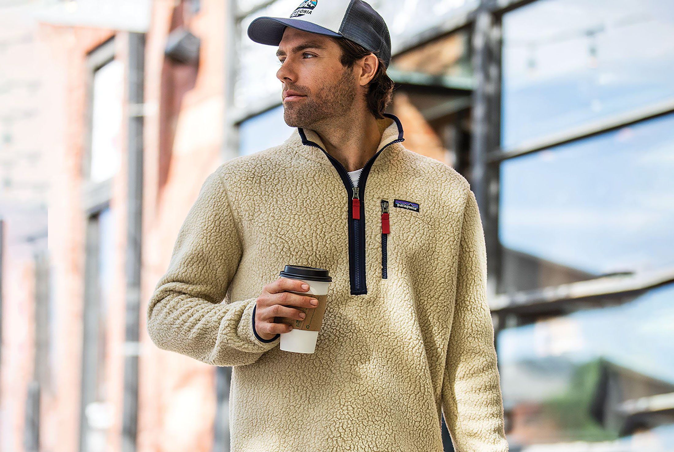 A man wearing a retro Patagonia fleece.