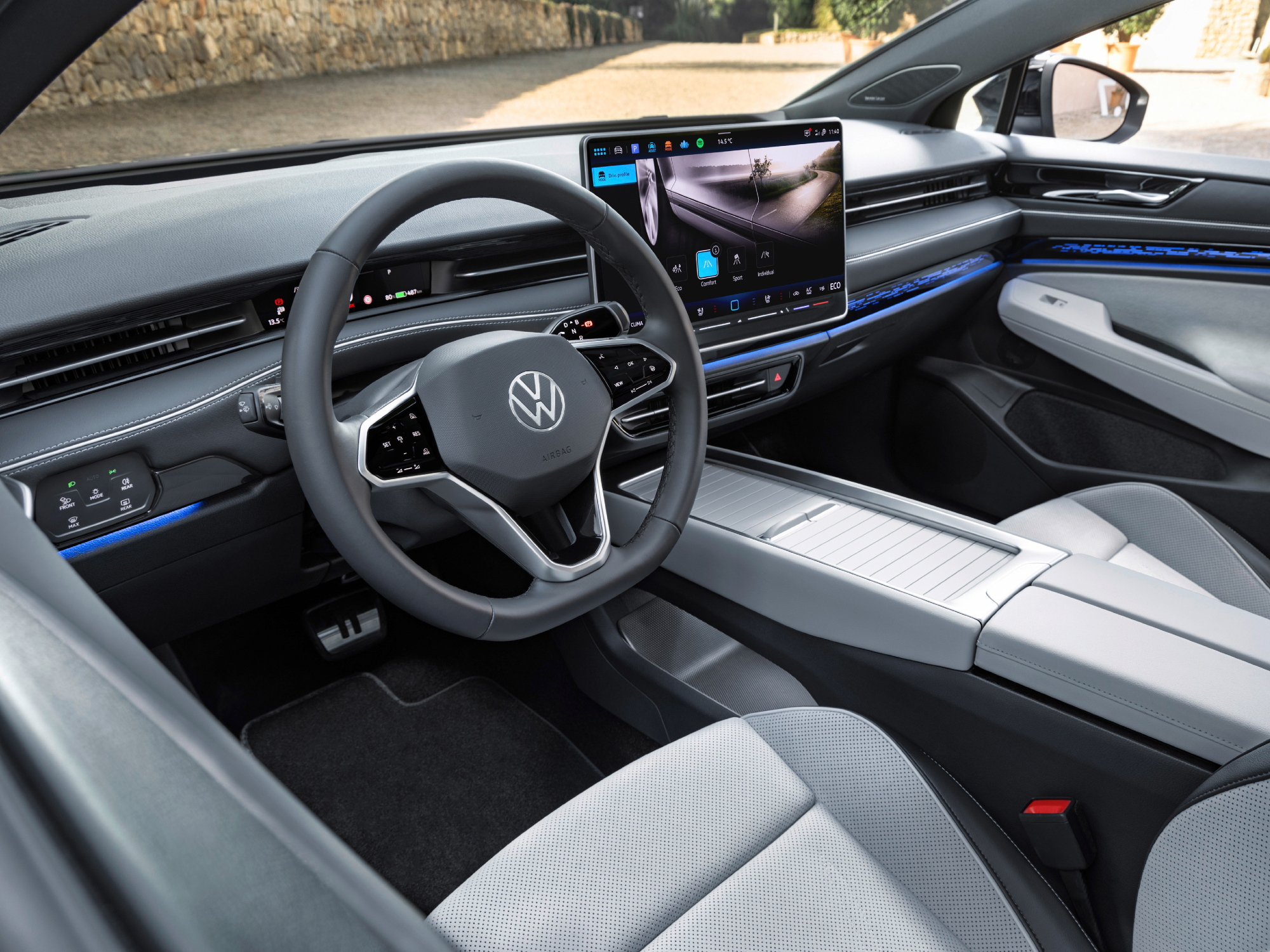 VW ID.7 concept interior image through driver's window showing large center display and console.