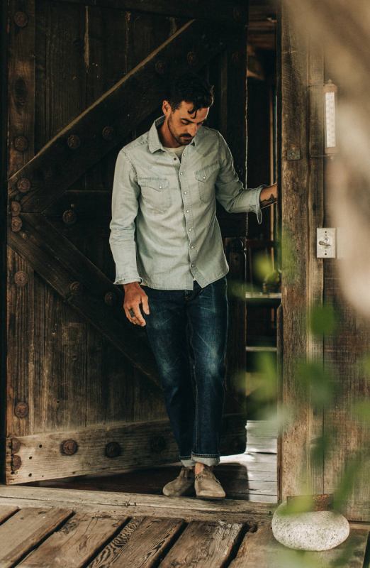 Man in Taylor Stitch The Western Shirt in Washed Denim