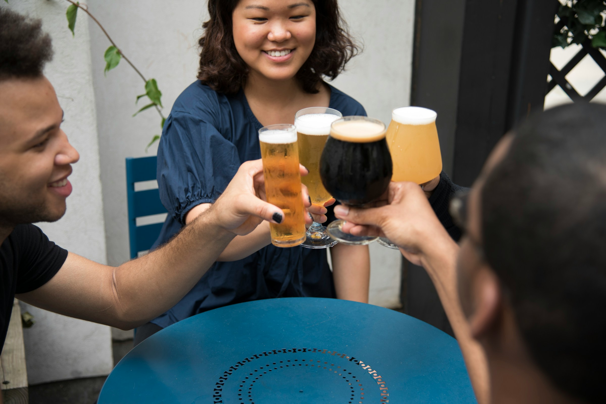 Friends toasting with beer