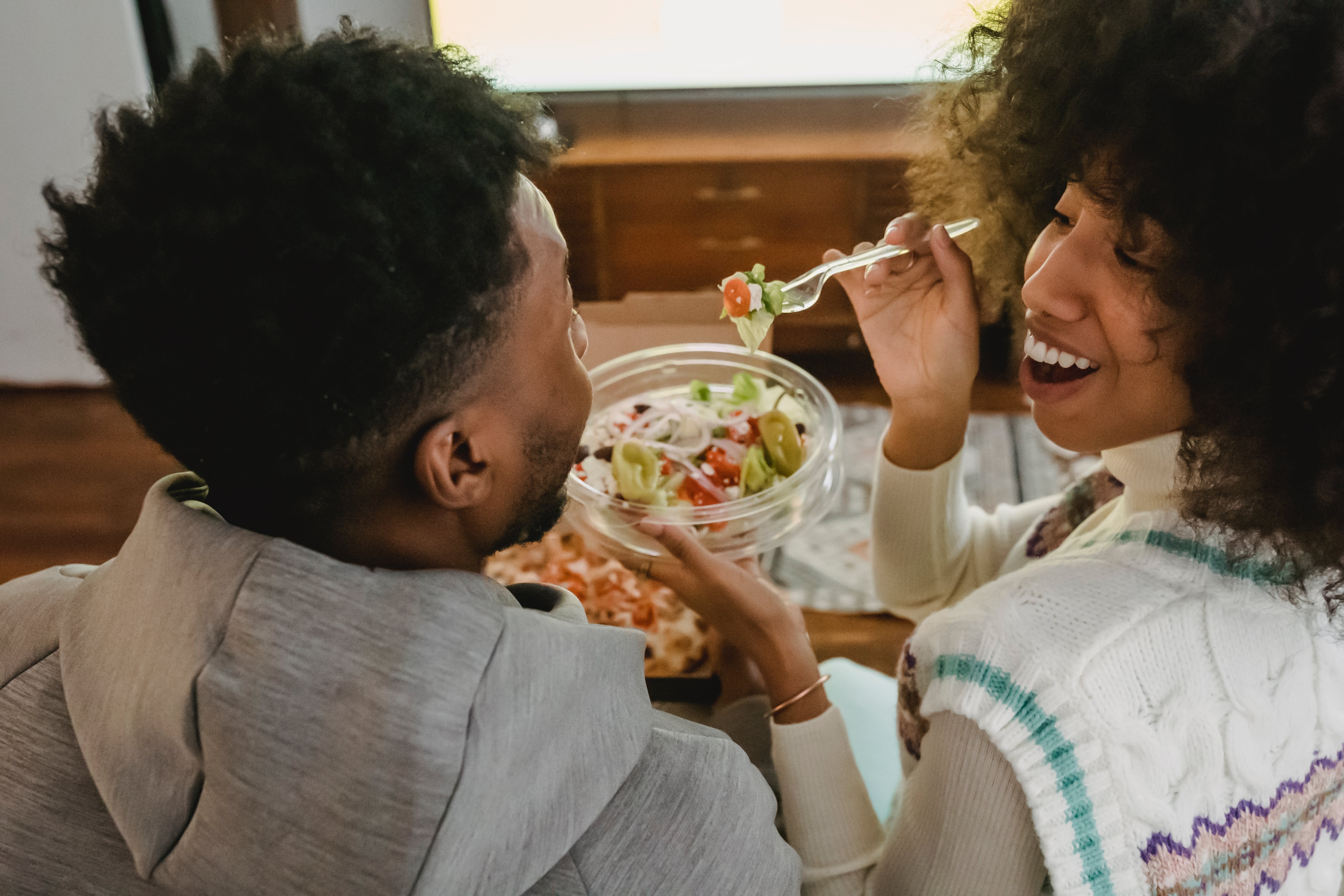 Man and women sharing a meal together