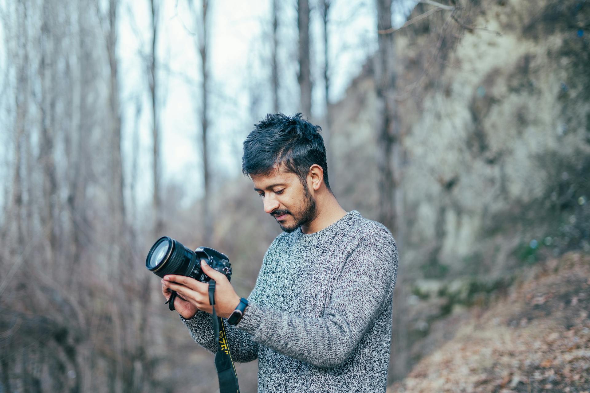 man wearing tweed sweater