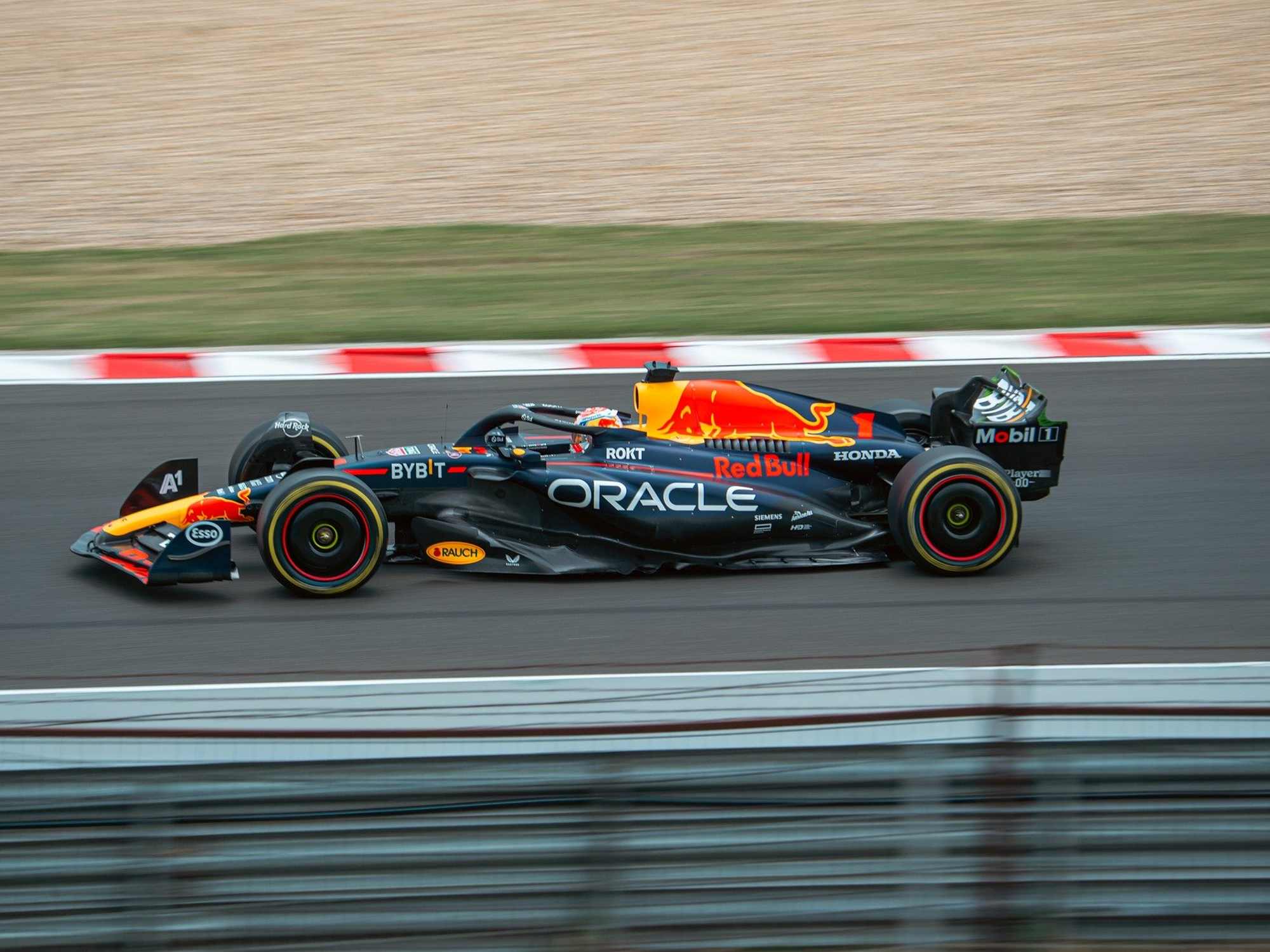 Max Verstappen driving a Red Bull F1 race car.