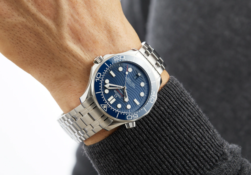The OMEGA Seamaster Diver 300 Co Axial on a man's wrist.