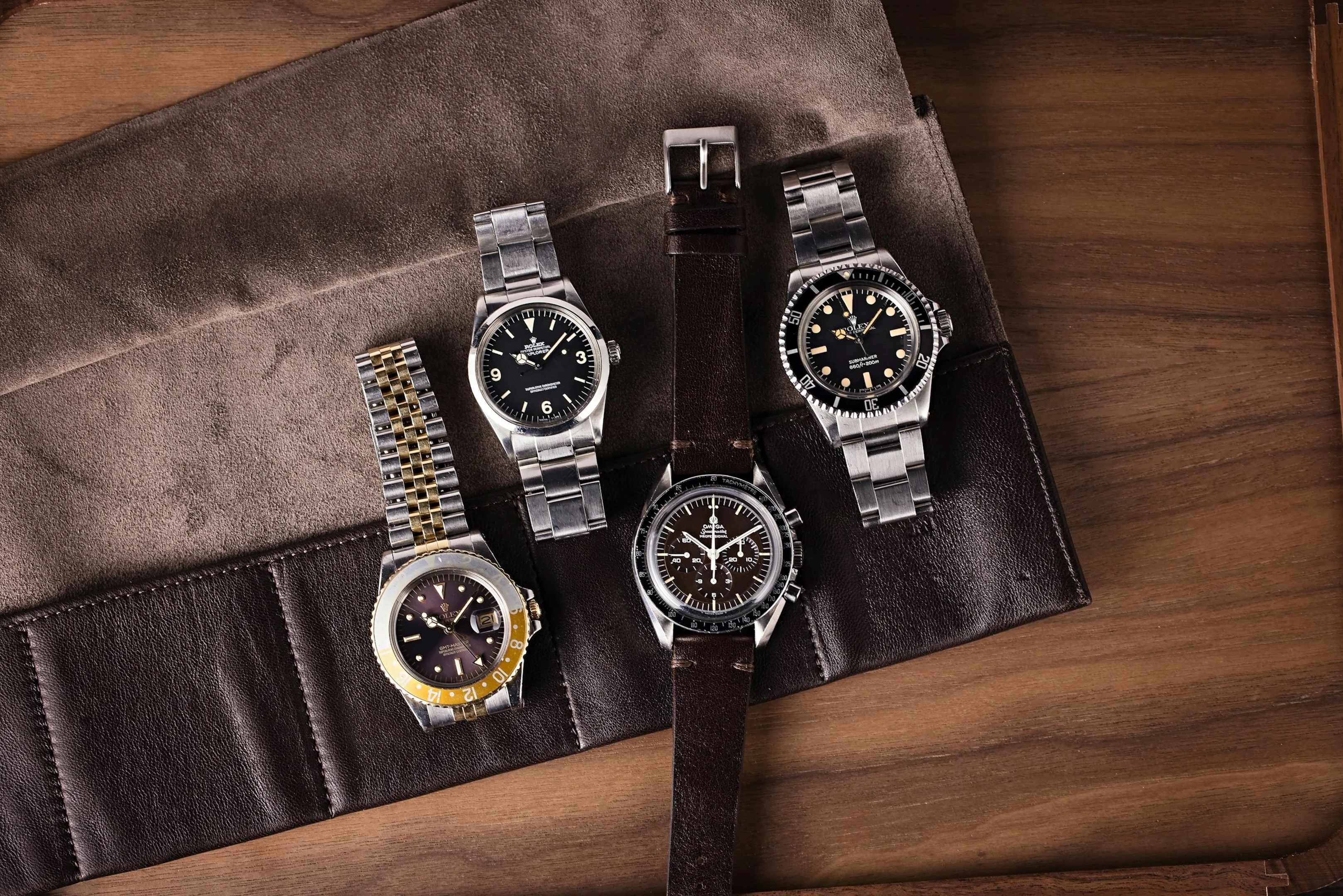 Omega and Rolex watches.