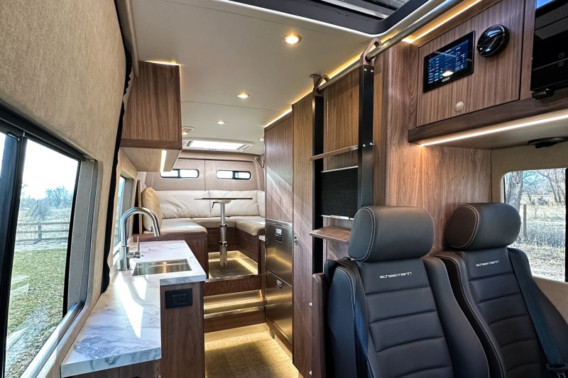 Luxurious interior of Redtail Overland's Skyloft campervan.
