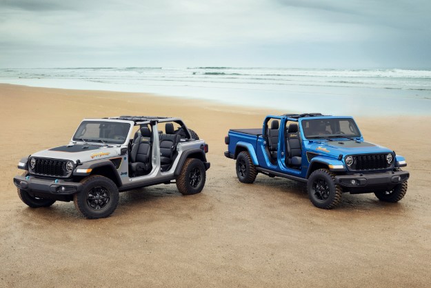 2024 Jeep Wrangler 4xe Beach and 2024 Jeep Gladiator Beach limited-run editions parked on an ocean beach.
