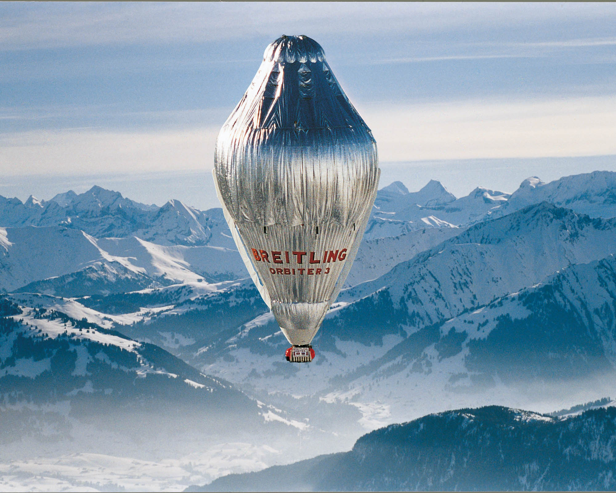 Breitling balloon over mountains