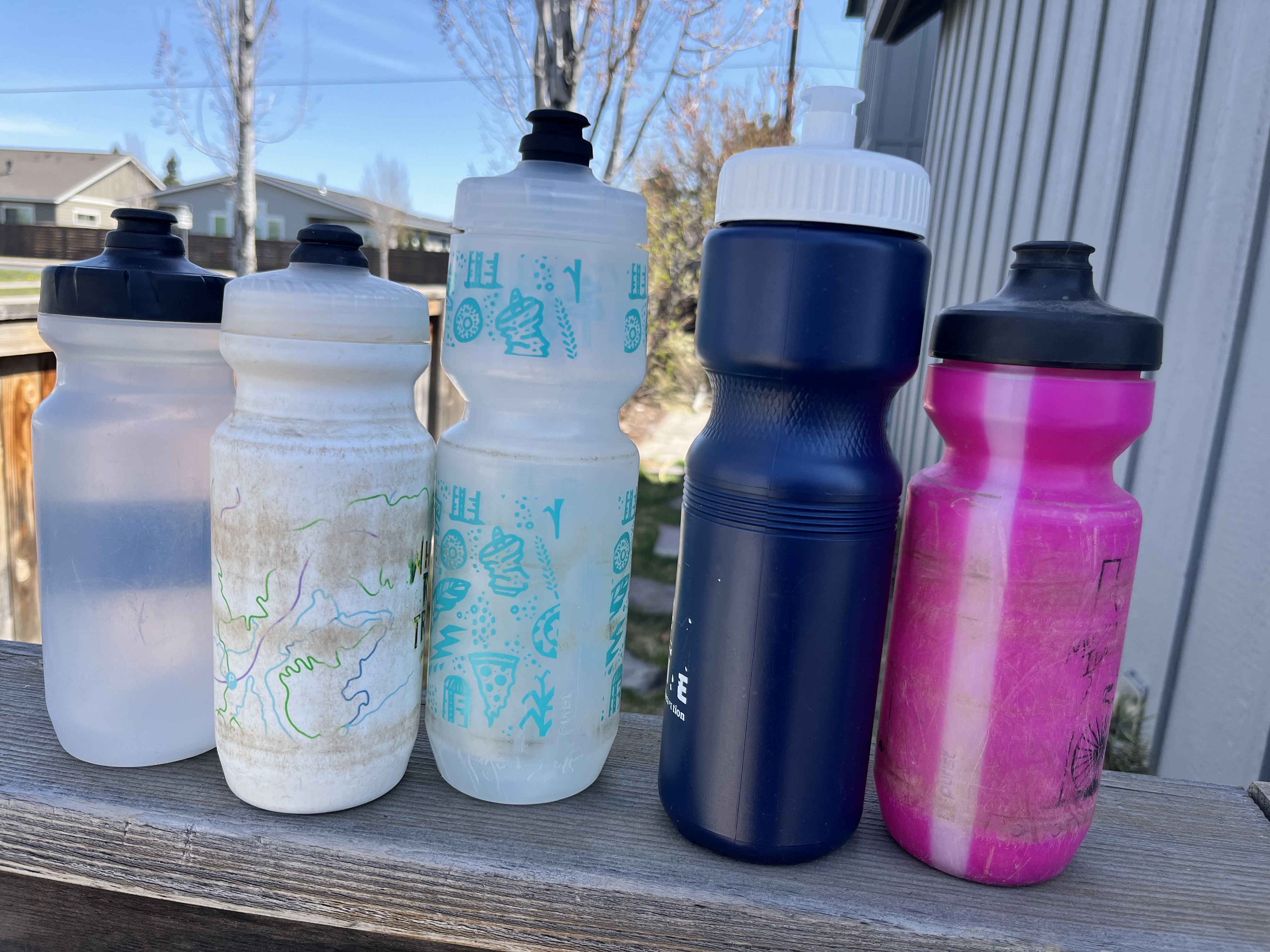 Several mountain biking water bottles