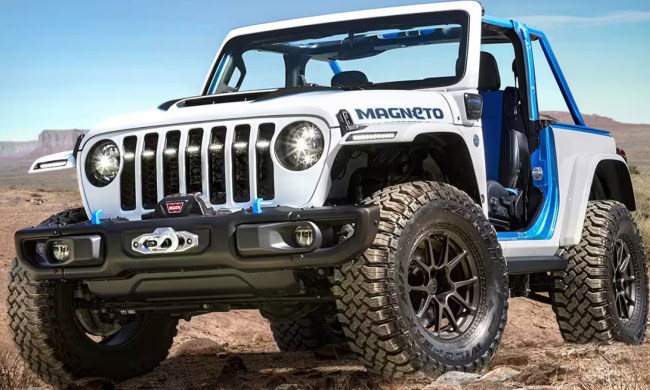 electric jeep wrangler wrangter magneto 1 0 concept parked on a rocky rise in the desert