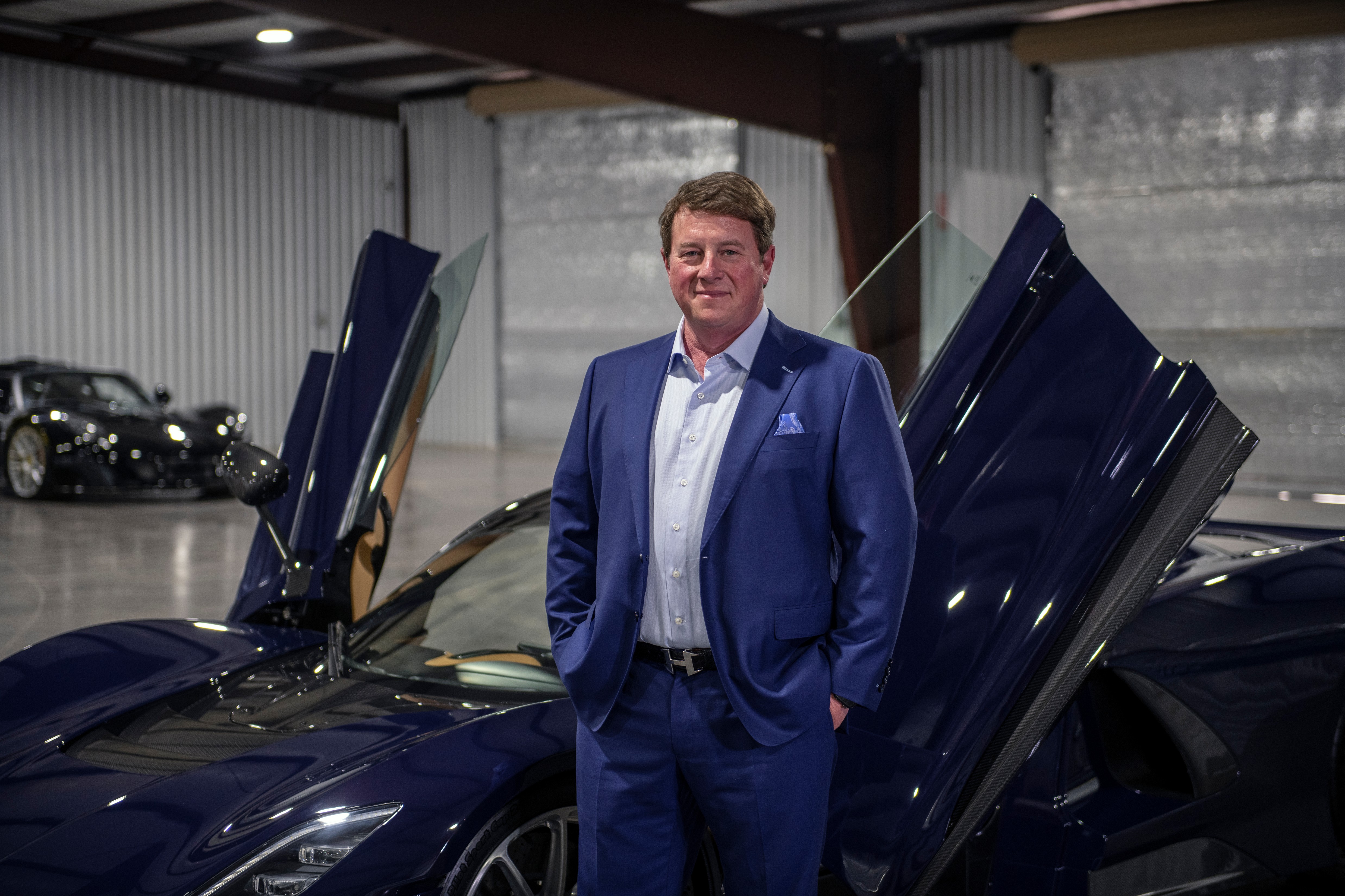 Jon Hennessey standing in front of a Venom F5