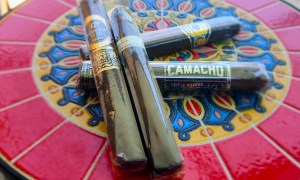 Maduro cigars on Spanish decorative tile table