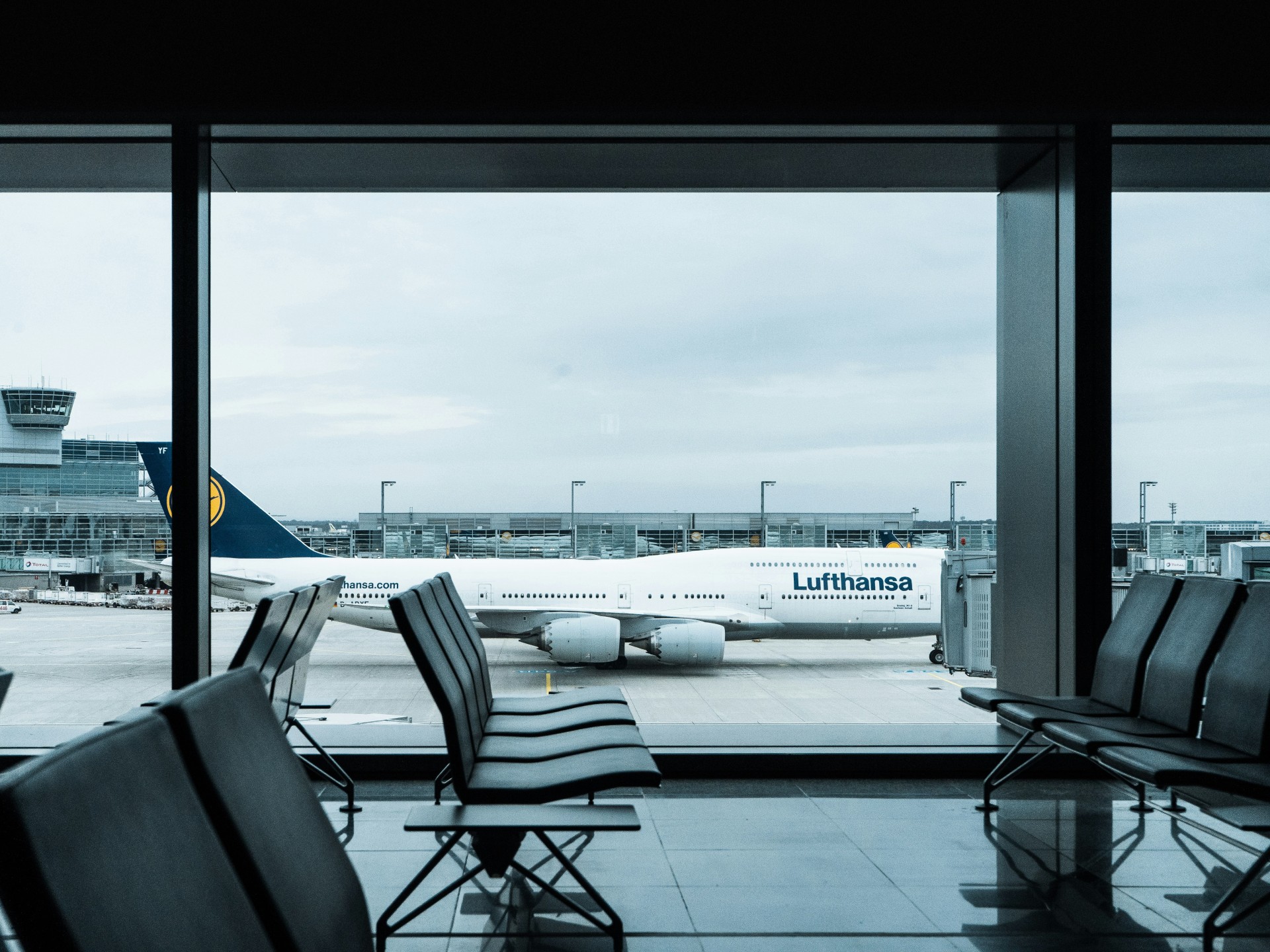 Airplane passing by terminal