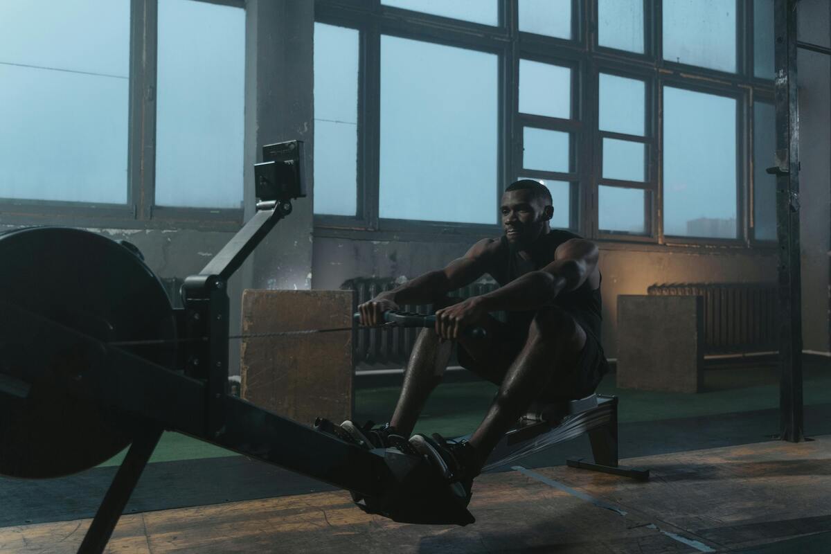Man on a rowing machine.