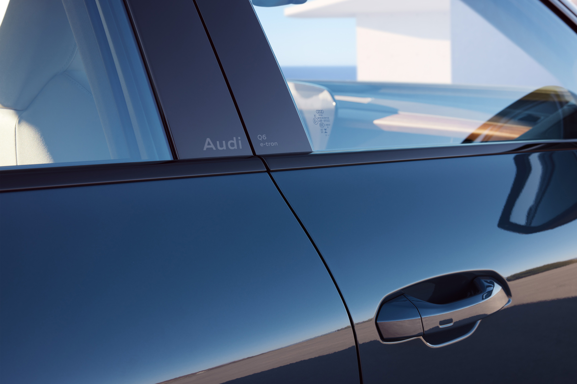 Audi Q6 e-tron right side front window and door handle.
