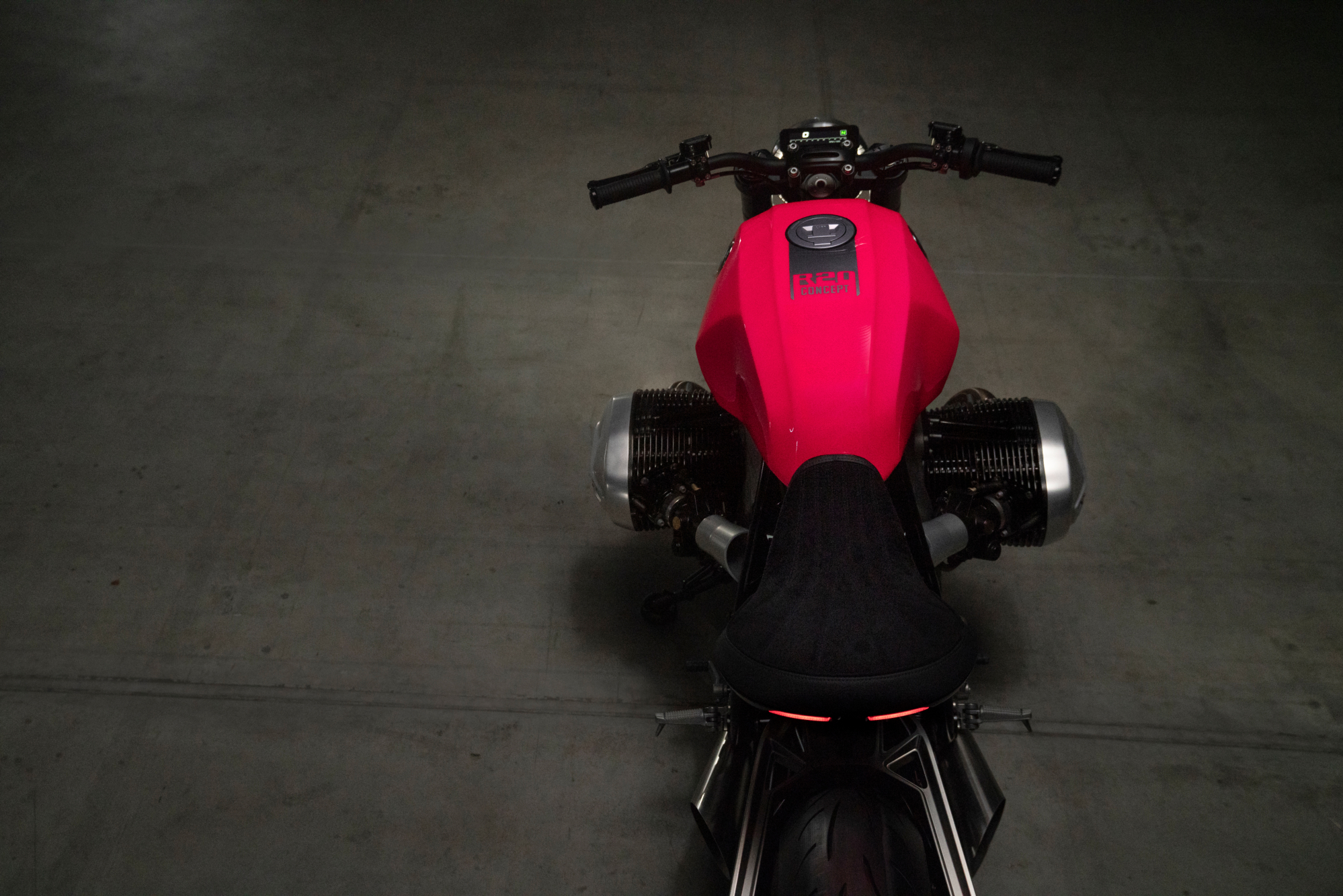BMW Motorrad BMW R20 Concept motorcycle looking from behind over the saddle, tank, and bars.