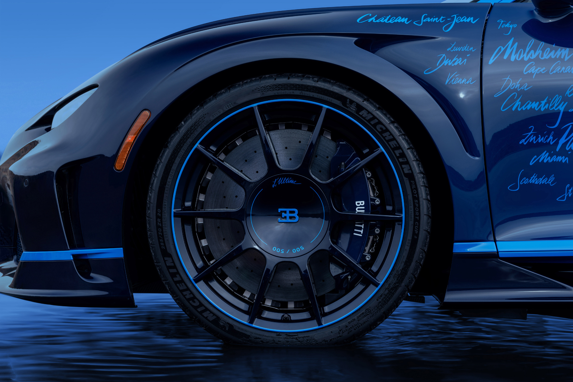 Bugatti Chiron Super Sport L'Ultime left front wheel and fender with notes of the model's 500-unit history..