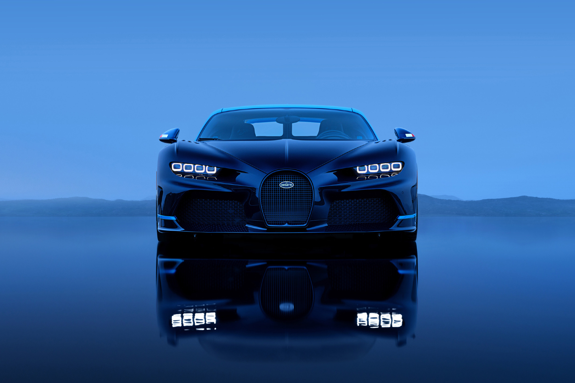 Bugatti Chiron Super Sport last of 500 direct front view with mirror reflection below.
