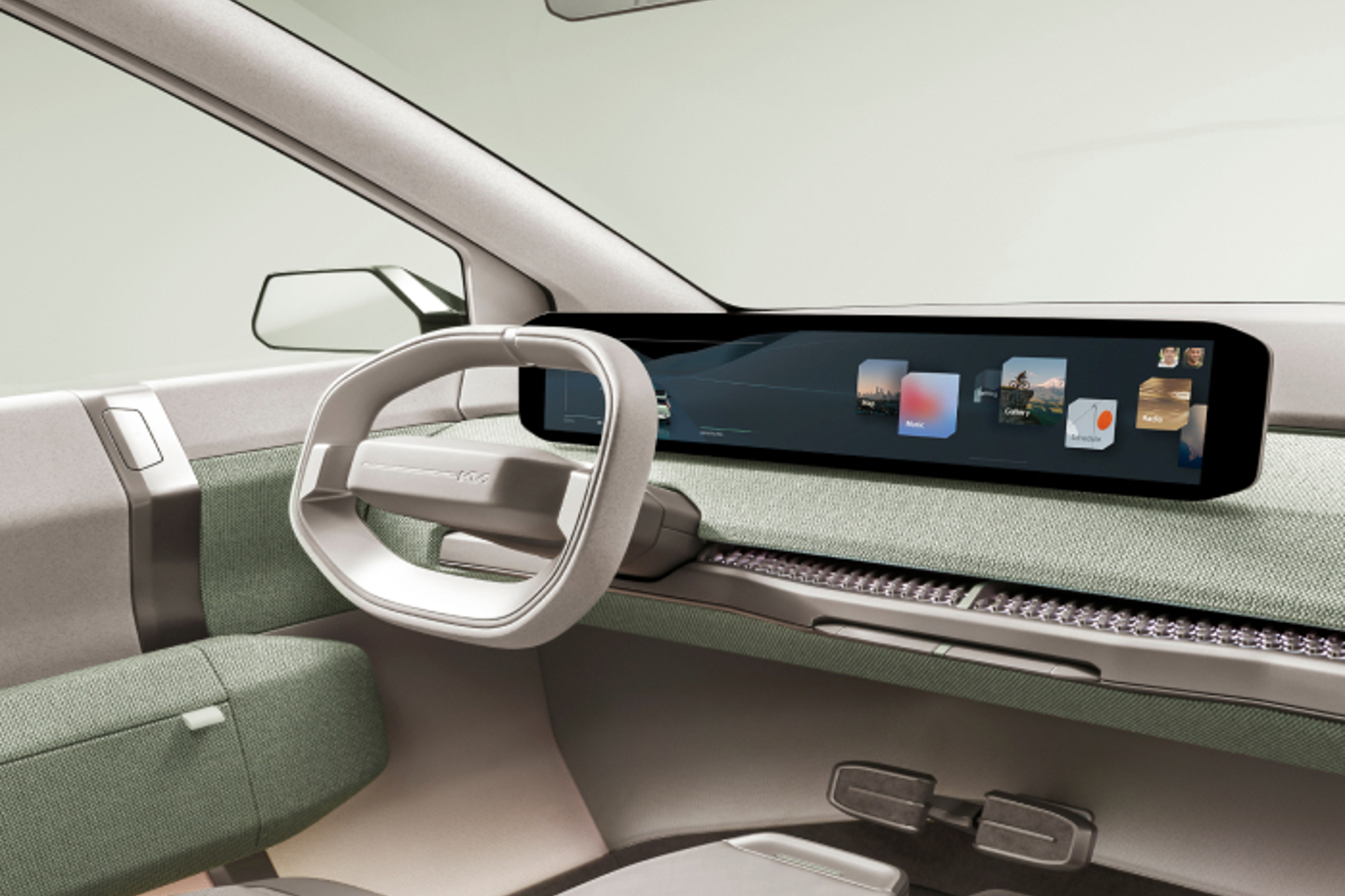 Kia EV3 Concept car view of the 30-inch dashboard display and the driver seat.